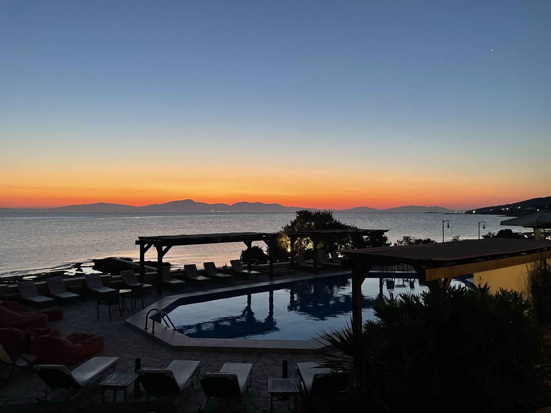 Sunset over the pool and Aegean Sea